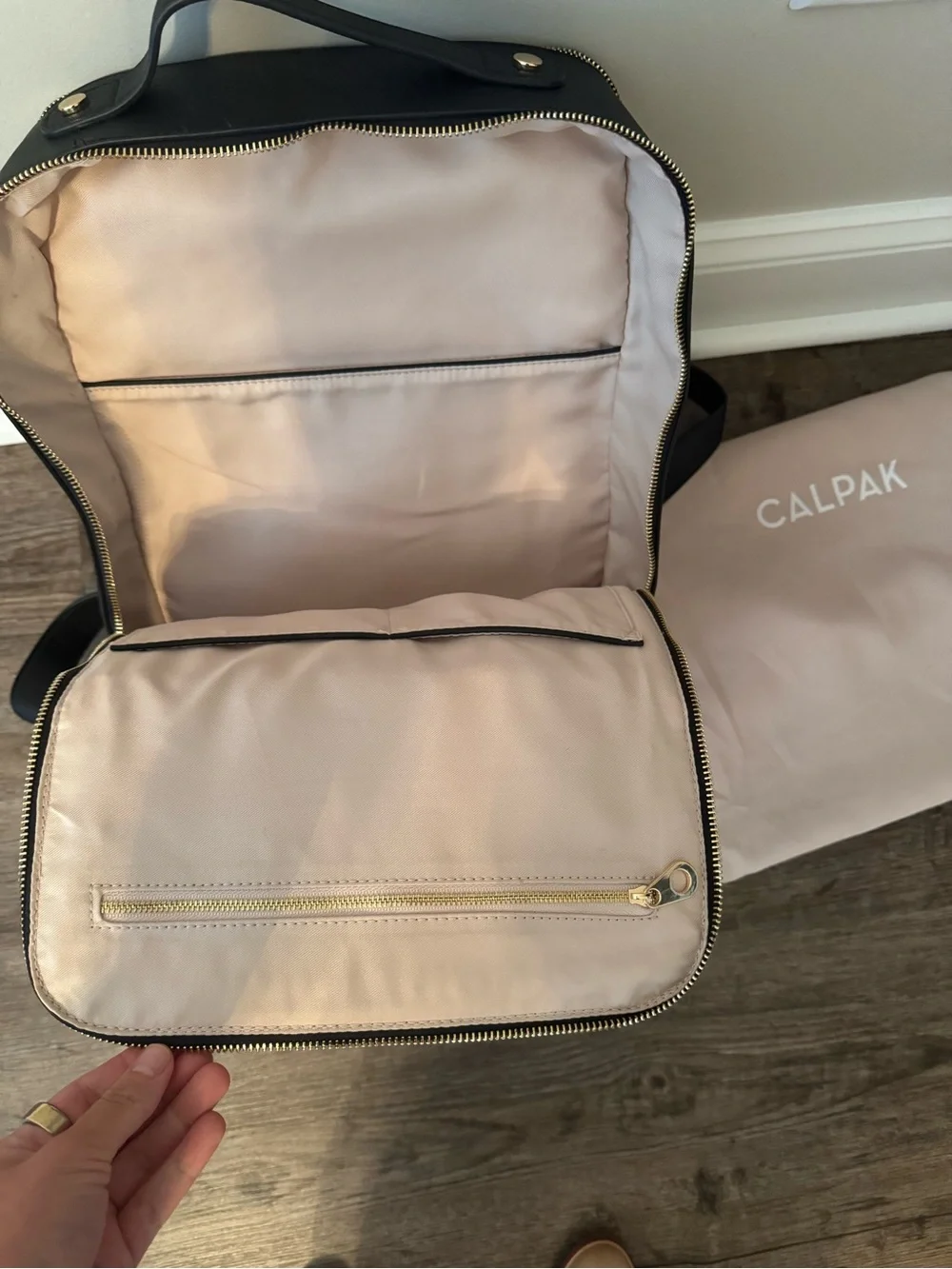 Calpak Black Backpack with Woven Trim and Gold Hardware